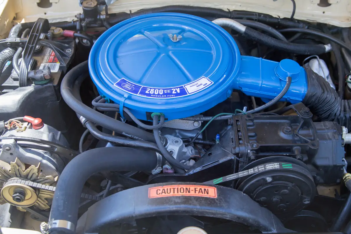 Ford 2.8L Cologne V6, one of the Worst Mustang Engines. image couresy of Wikimedia Commons: https://upload.wikimedia.org/wikipedia/commons/7/74/1977_Ford_Pinto_Squire_Wagon%2C_2.8_2V_V6_engine.jpg
