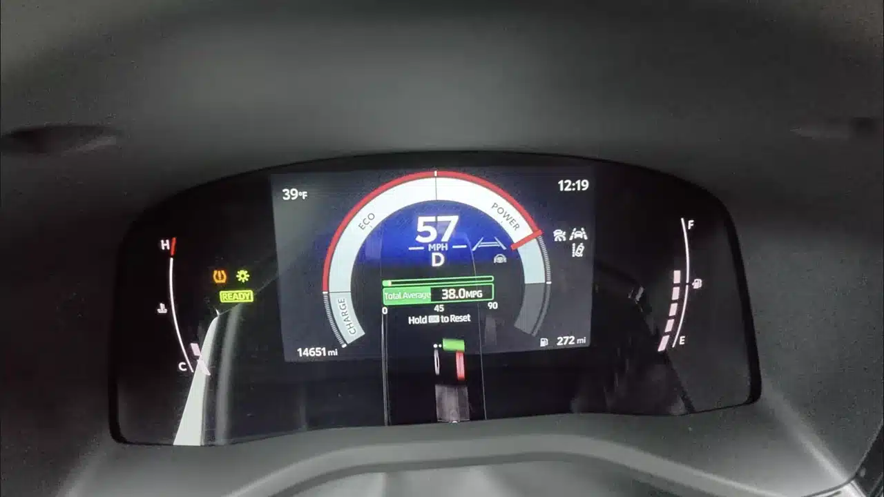 Camry instrument display showing 38.0 mpg and 14,651 miles