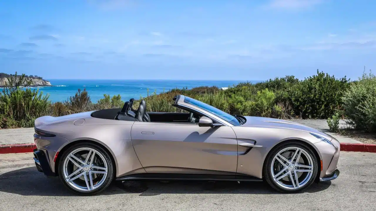 Silver Aston Martin Vantage Roadster Heritage Edition with its roof lowered