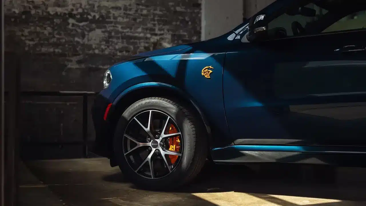 After Dark blue paint on the front fender of a Dodge Durango SRT Hellcat