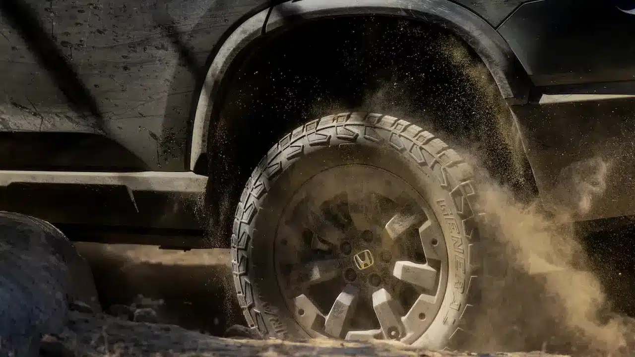 2027 Passport TrailSport wheel and suspension on rough terrain