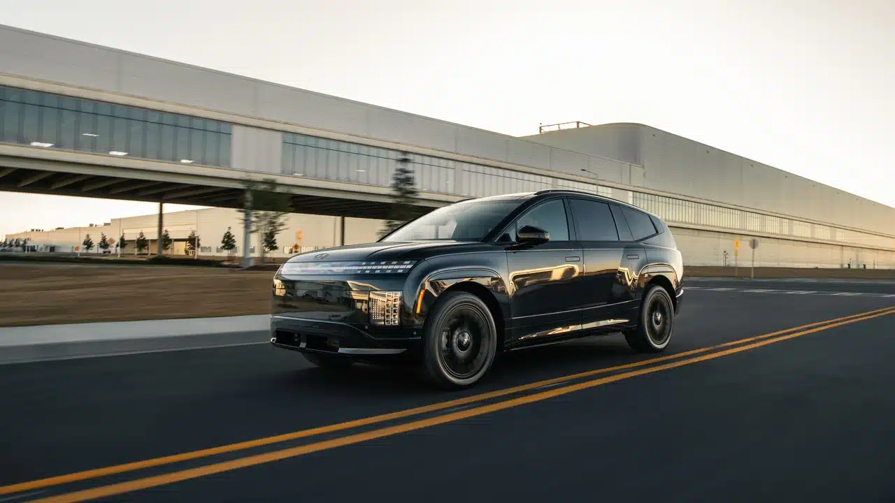 2027 Hyundai Ioniq 9 Black Ink driving past Hyundai’s Georgia plant