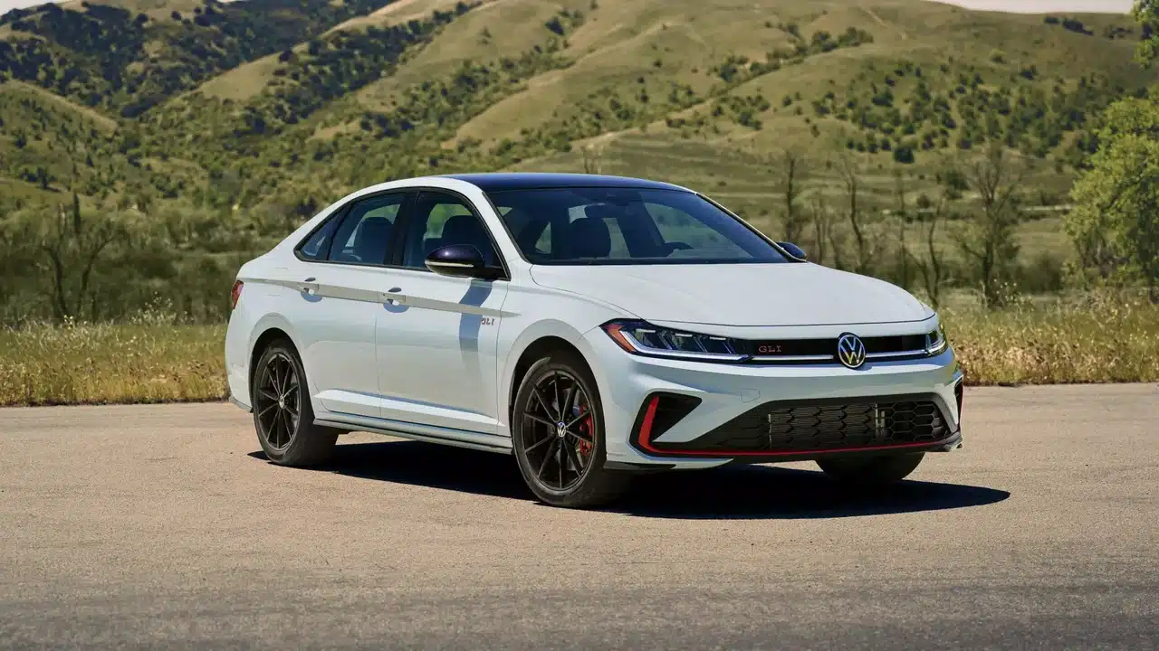 Gray 2027 Volkswagen Jetta GLI parked near green hills