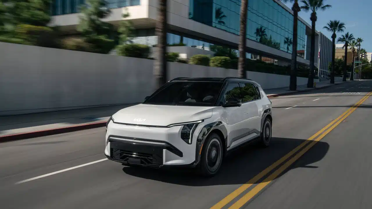 2027 Kia EV3 driving through a city
