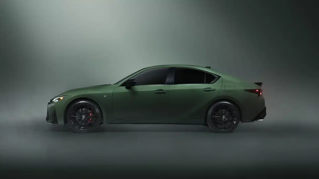 Side profile of a 2027 Lexus IS in Envious green