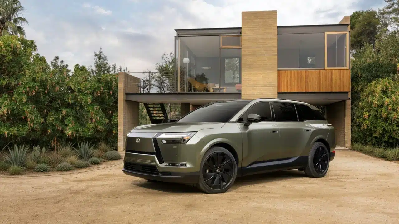 2027 Lexus TZ parked outside a modern home