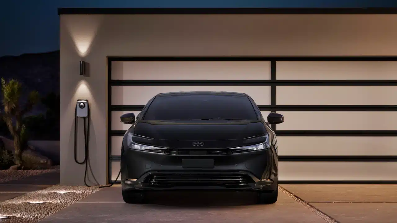 2027 Toyota Prius Plug-in Hybrid connected to a home charger