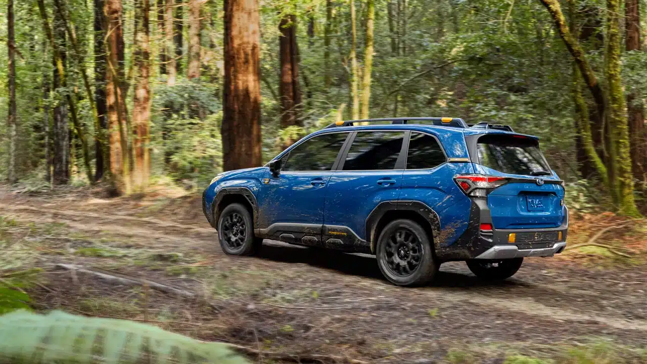2027 Subaru Forester Wilderness driving on a forest trail