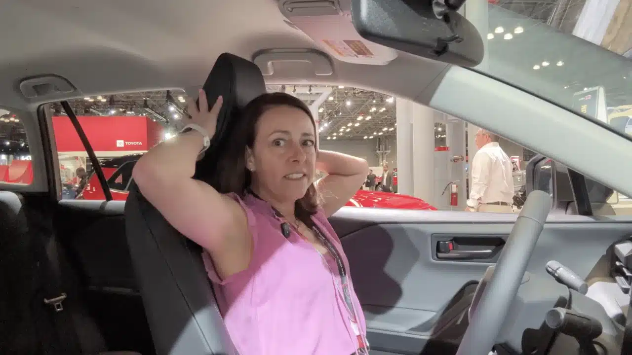 Jill Ciminillo checks the Toyota RAV4 head restraint