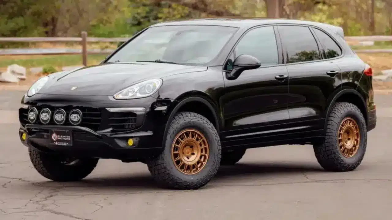 Lifted black 2015 Porsche Cayenne Diesel with bronze wheels