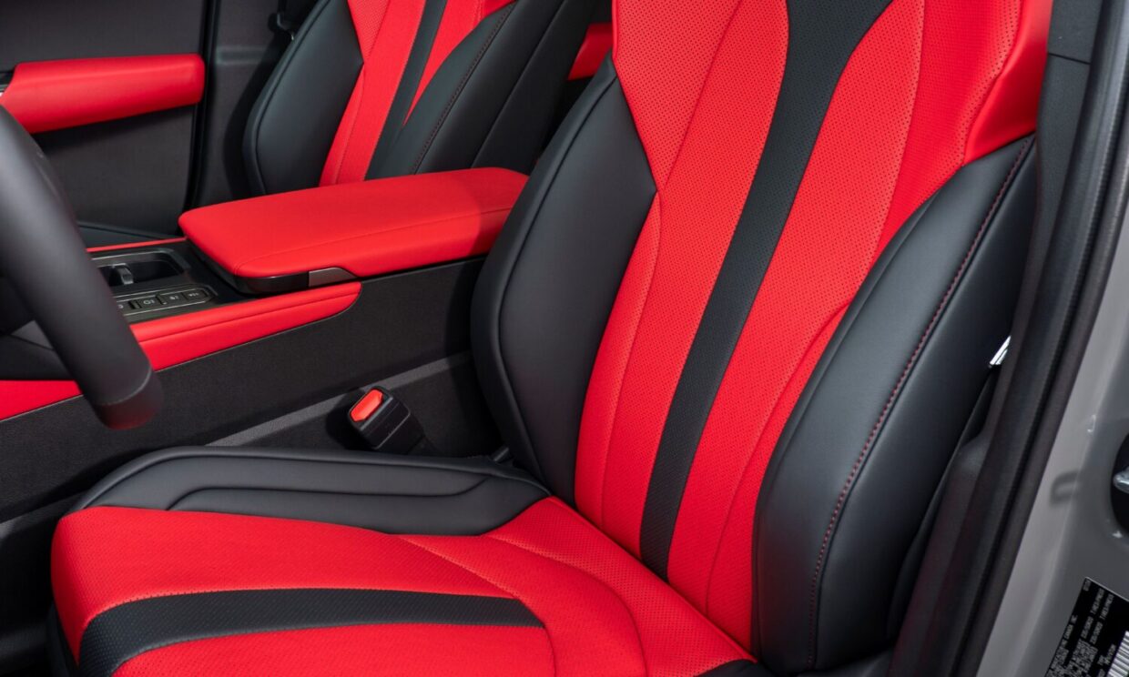 Red and black front seats in the 2027 Lexus NX 350h F Sport